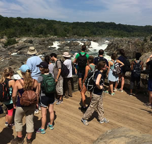 Visitors enjoy the view of the Great Falls of the Potomac River along the Chesapeake & Ohio Canal National Historical Park on August 25, 2016, the NPS Centennial.