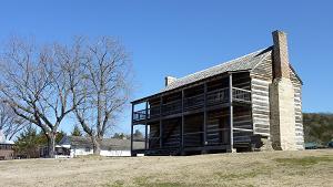 view of the south and west facades of the Wolf House.