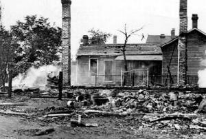 1908 Springfield Race Riot, black and white photo of home with debris in front of it.