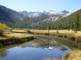 Mount Lyell and Lyell Glacier, reflected in the Lyell Fork of the Tuolumne River. 