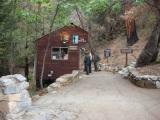 Photo of existing kiosk and gift shop at the Crystal Cave trailhead, operated by the Sequoia Parks Conservancy. 