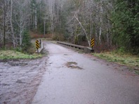 Existing bridge across the Lyre River