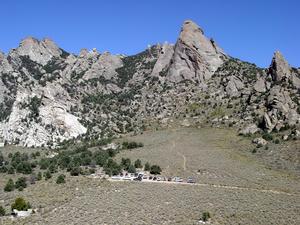 The image is a photograph of the Circle Creek Overlook Project Area from the top of an unamed rock formation. 