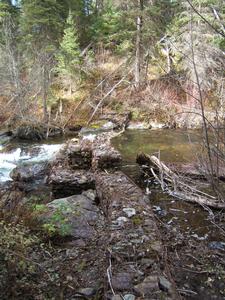 Photo of the existing Quartz Creek fish barrier.