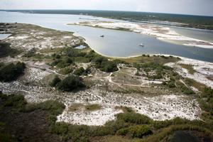 Fort Mcree at Perdido Key area in foreground, Big Lagoon and Robertson Island in background.  2 boats on the water.