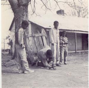 Young Tenants Play Marbles at the Magnolia Plantation Quarters
CARI-150 Ambrose J. Hertzog III Collection