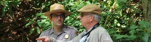 Photo of Park Ranger talking to park visitor