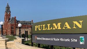 The image is of the Pullman National Monument and State Historic Site Administration Building and the entrance sign.