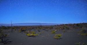 An early evening view of the Mauna Loa summit and ridgelines from near the Footprints interpretive area in Hawaiʻi Volcanoes National Park. Photo by Jesse Tunison.