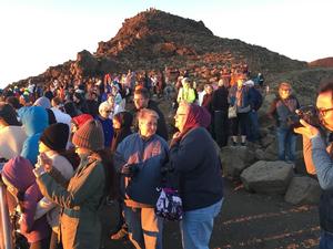 crowds at the summit during sunrise hours