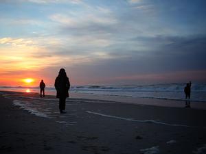 People enjoy sunset views in the designated wilderness of Fire Island National Seashore.