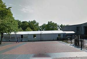 Photo of the screening tent leading from the Main Mall to the main entrance to Fort Wood.