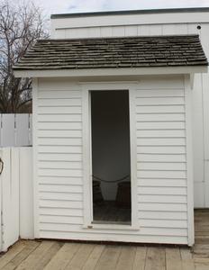 Photo of the historic privy in the Lincoln Home backyard