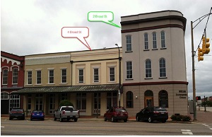 Urban street view of the Selma Interpretive Center building and 4 Broad Street building.
