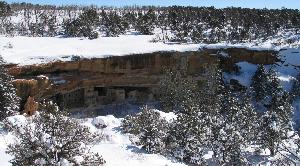Photograph of Spruce Tree House alcove and cliff dwelling after a snow storm.
