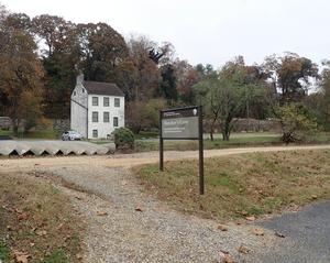 Photo of the Abner Cloud House and C&O Canal from Capital Crescent Trail