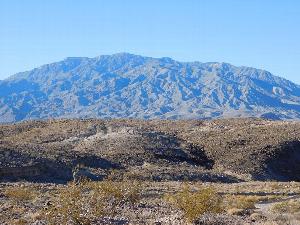 Photo of the former Grapevine Firing Range in the foreground with Tucki Mountain visible in the distant background.