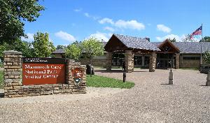 Image of Visitor Center and sign that reads Mammoth Cave National Park Visitor Center