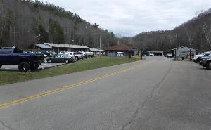Photograph of existing buildings and National Park Service staff parking at the existing Sugarlands Maintenance Area in Great Smoky Mountains National Park.
