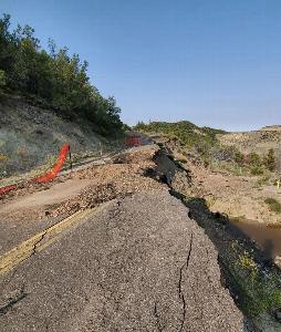 Photo of a major roadway failure on the South Unit Loop Road in Theodore Roosevelt National Park.